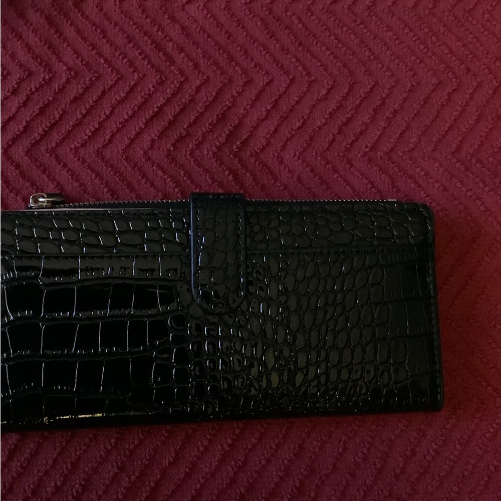 Faux patent leather wallet…